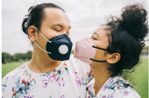 wearing face mask and social distancing